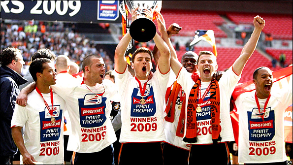 Luton players celebrate Wembley win