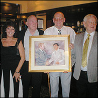 From left: Janet, Tommy, Richard and Don. Don has just presented Richard with a painting of his encounter with Muhammad Ali