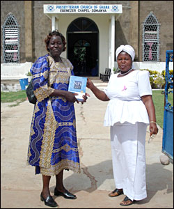 Alice and Somanya primary school head at church