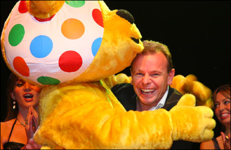 Shaun Peel is hugged by Pudsey