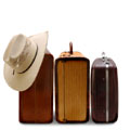 Holiday suitcases and a sun hat