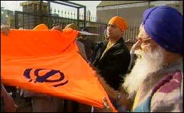 Wrapping the Vaisakhi flag 