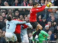Manchester United player Ronaldo handling the ball