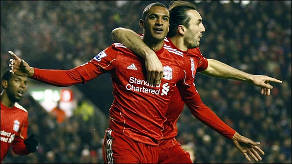 David Ngog celebrates after puttign Liverpool in front. Photo: AP