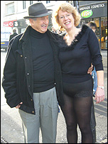 Monica without a skirt and a man in the street