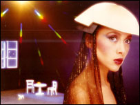 Jennifer shows off a hat from her modelling career