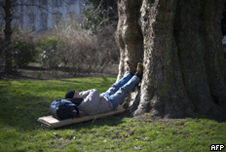 a man putting his feet up