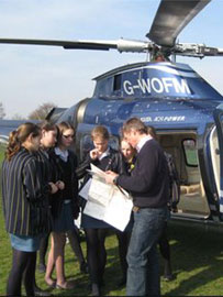 Pupils brief helicopter pilot