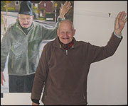 Nigel imitates his portrait