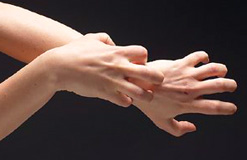 Hands scratching each other