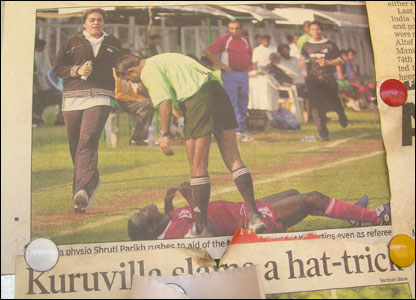 newspaper cuttings on a notice board