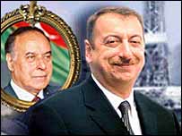 الهام علی اف در برابر تصوير حيدر علی اف