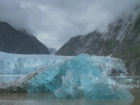 A glacier carves out a U-shaped valley