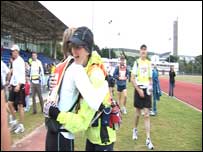 Two athletes hugging