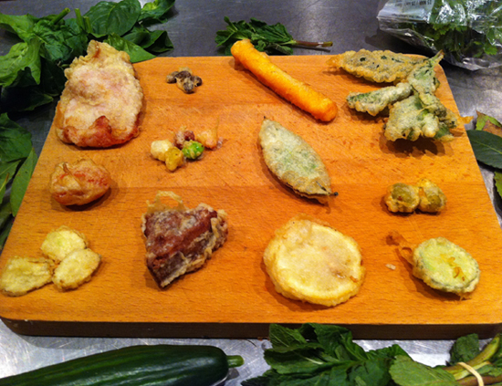 Various deep-fried foods, from smoked bacon to cucumber.