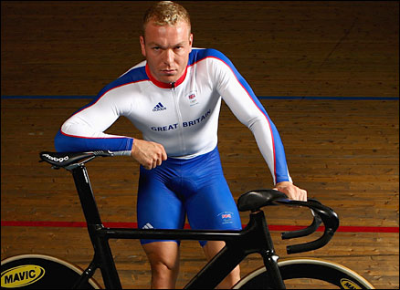 Chris Hoy leans on his bike