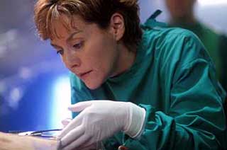Amanda Burton as police pathologist Sam Ryan
