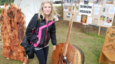 Heledd Walters from Swansea, tries out Simon's double bass instrument.
