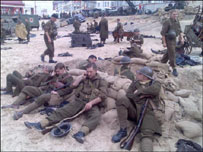 Soldiers await the commands