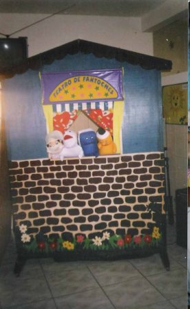 a dentist, a white little tooth, a toothbrush and a toothpaste.