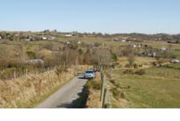 Golygfa o Benuwch a'r mân dyddynod