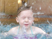 Tehya cools down under a waterfall