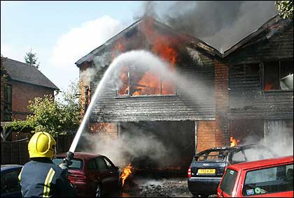 A Fire Fighter tackles the blaze