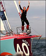 Sam Davies crosses the finish line