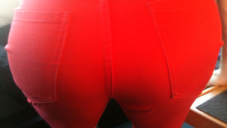 Bottom in tight red trousers