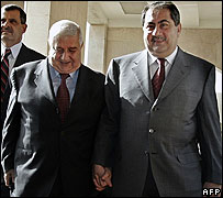 Muallim (bên trái) là nhân vật cao cấp nhất của Syria thăm Iraq từ 2003