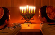 Children and a menorah Image