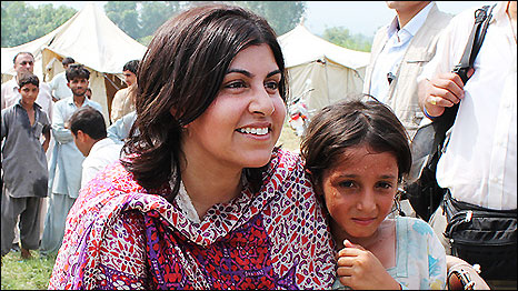 Baroness Warsi with a young flood survivor in Pir Sabak, Pakistan. Credit: Vicki Francis / Kate Joseph / Department for International Development (DFID)
