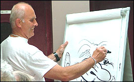 Cartoonist Terry Christien in action