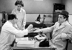 An image from Hancock's Half Hour of a doctor examining a Hancock.