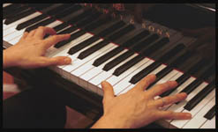 Hands Playing Piano