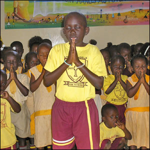  Uganda: Pupils at Little Angels Nursery School lead prayers at their graduation ceremony to primary school. From Emojong Augustine, Tororo