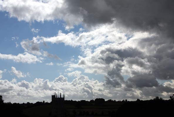 Dark clouds pass over a rural scene in the village of Norton St Philip, Somerset, 19/07/2008.