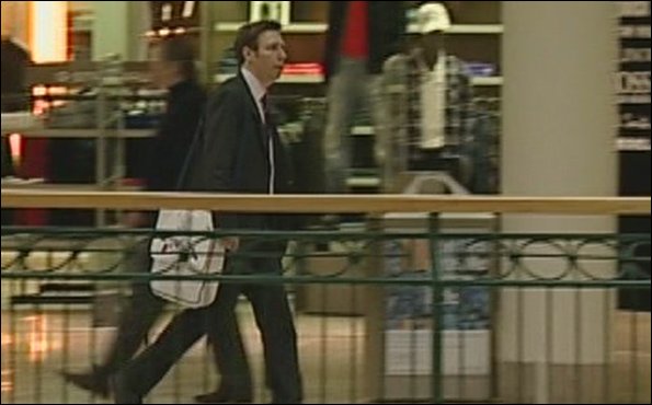 Man about town Richard Moss and his natty white Election 2010 bag