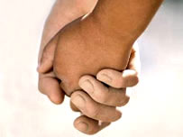 Parent and child holding hands