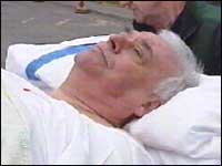 Brian Chaplin on a hospital bed