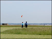 People flying kites at Cudmore Grove