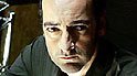 Gil (Alistair McGowan)