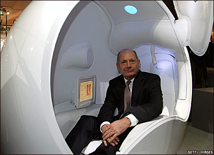 Ron Dennis tries out the Ovei capsule used to capture data on healthcare