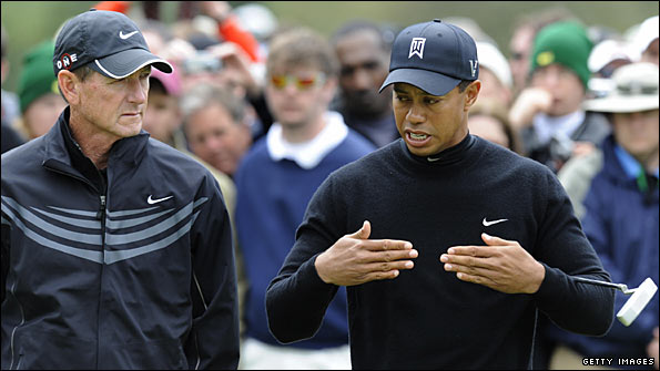 Tiger Woods is likely to conduct some remedial work on his swing with coach Hank Haney (left)