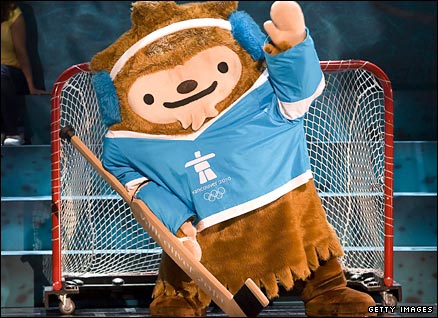 One of Vancouver 2010's three mascots, Quatchi, between the sticks