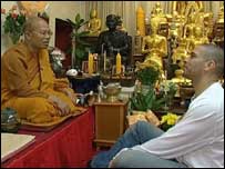 Stan Collymore and head monk Adjan