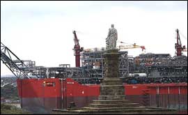 The Bonga passes the statue of Lord Collingwood as she sails out of the Tyne