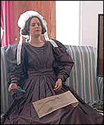 Model in 1830s costume inside Red House