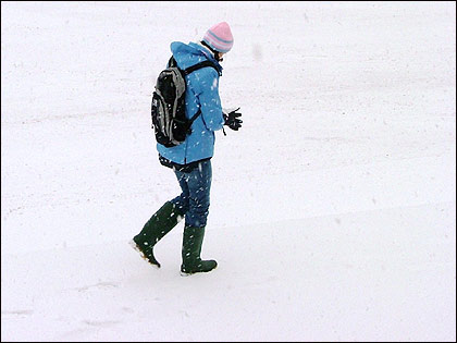 A person walking in the snow