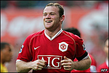 Wayne Rooney happy and smiling after scoring a goal